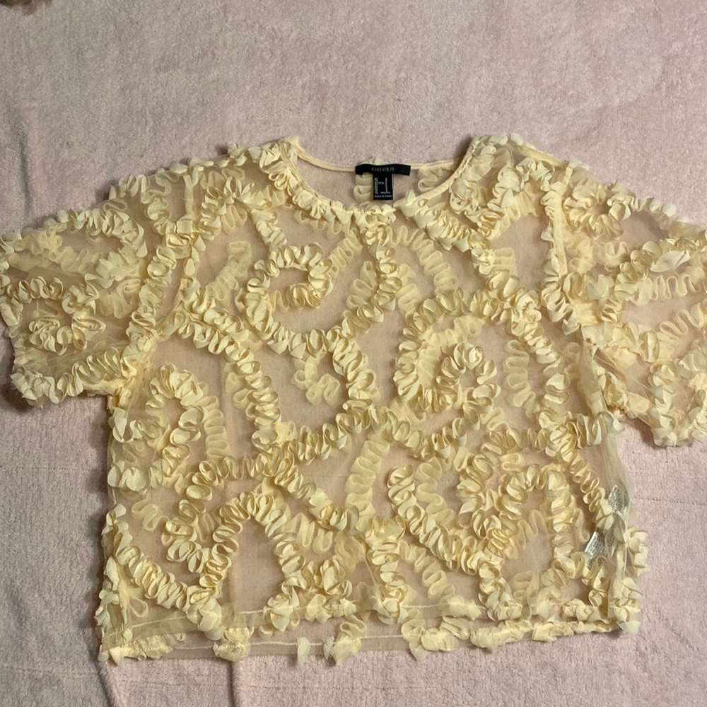 Forever 21. Size small. Cream Sheer blouse
